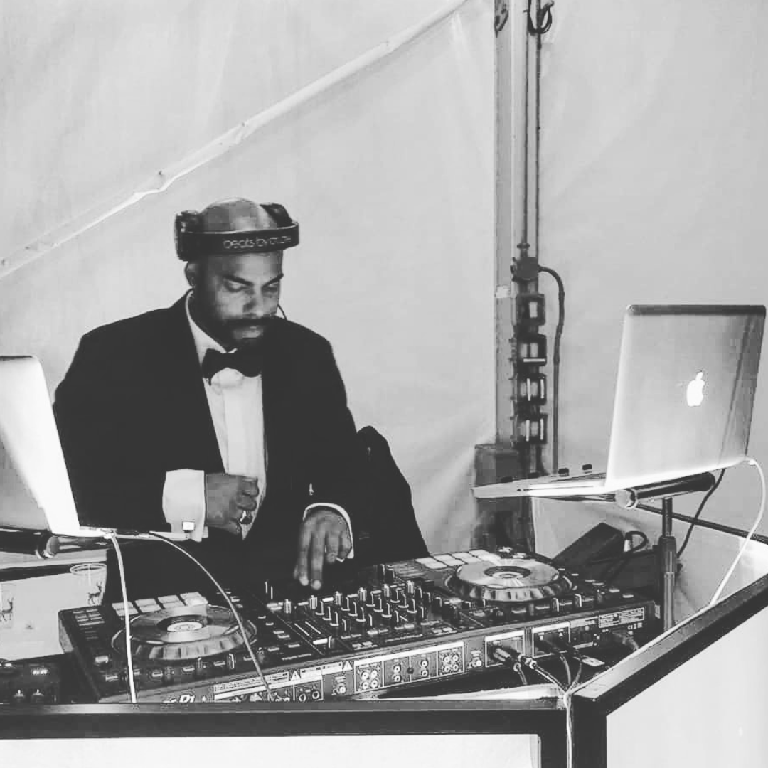 dj facade in suit_IG